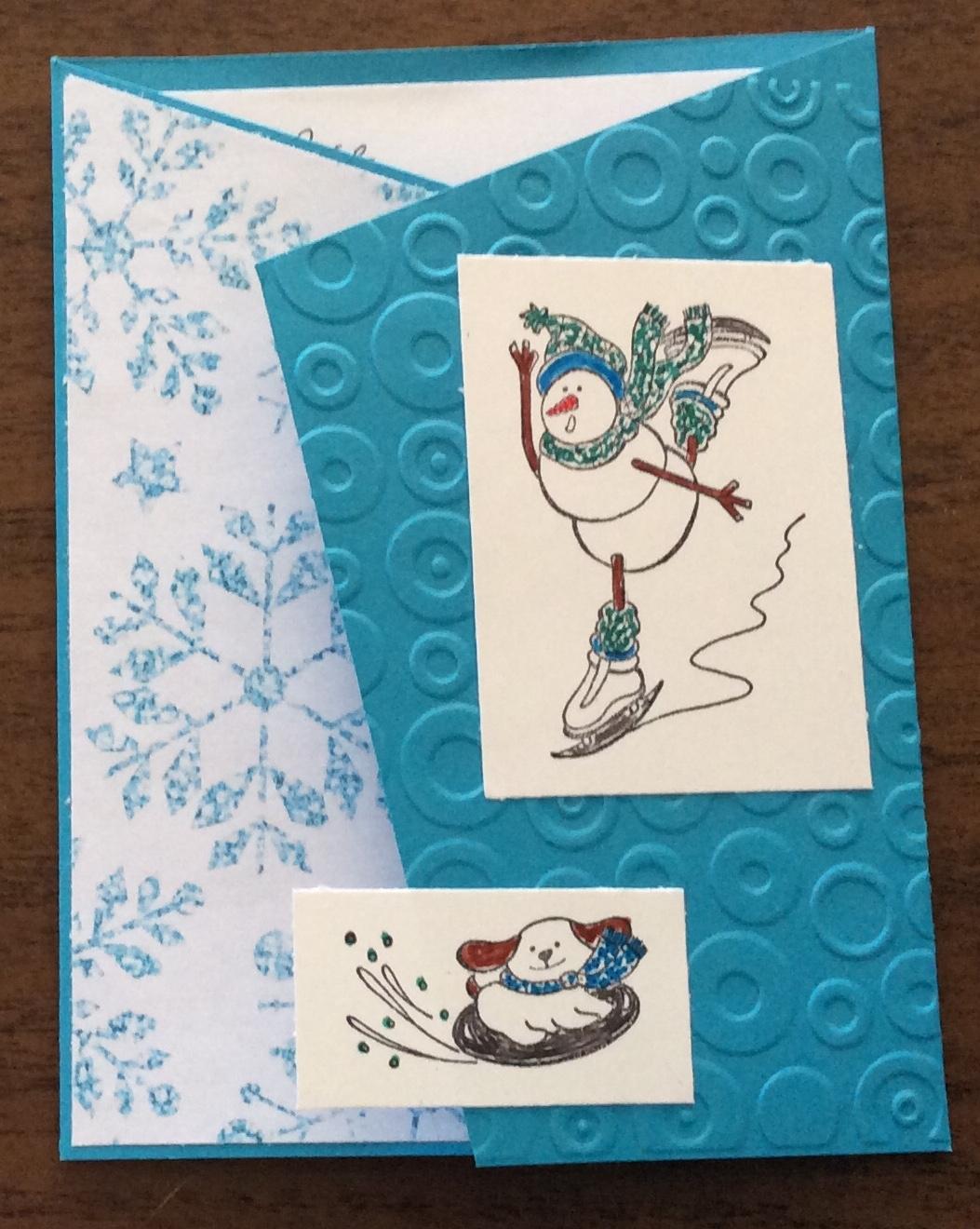 Blue and white card with snowman